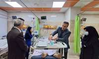 عیادت معاون درمان دانشگاه از مجروحین جنگی و بیماران بستری در بیمارستان 